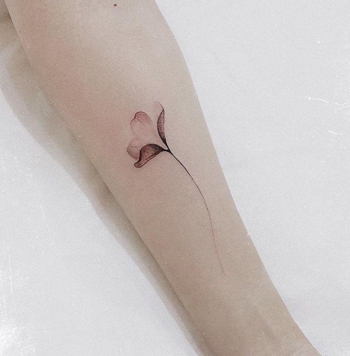 клевер на руке тату