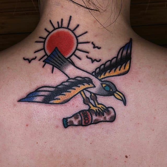 татуировка чайка на закате