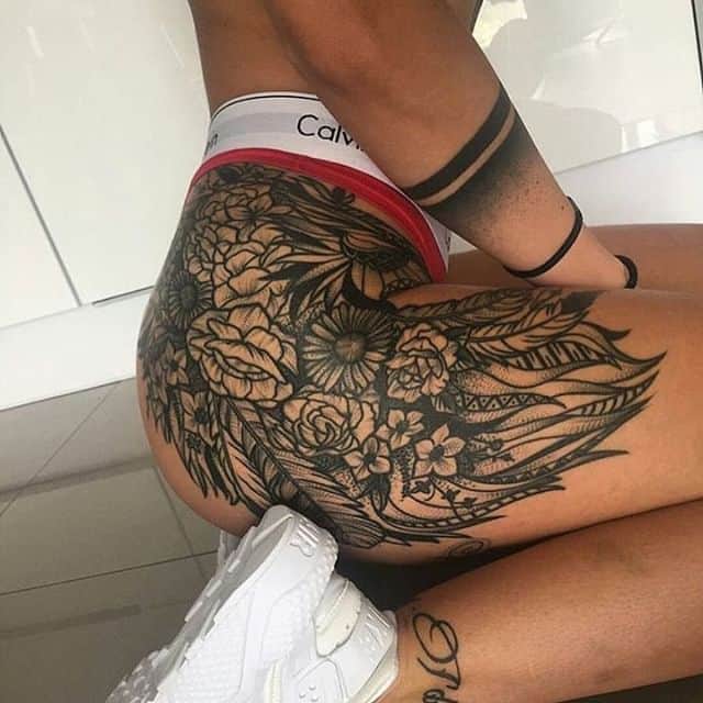 Женские тату на бедре