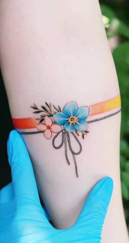 тату оранжевая нить