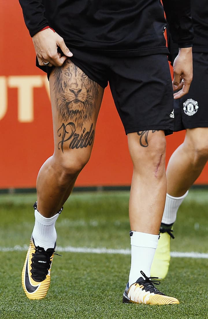 тату футболиста на ноге