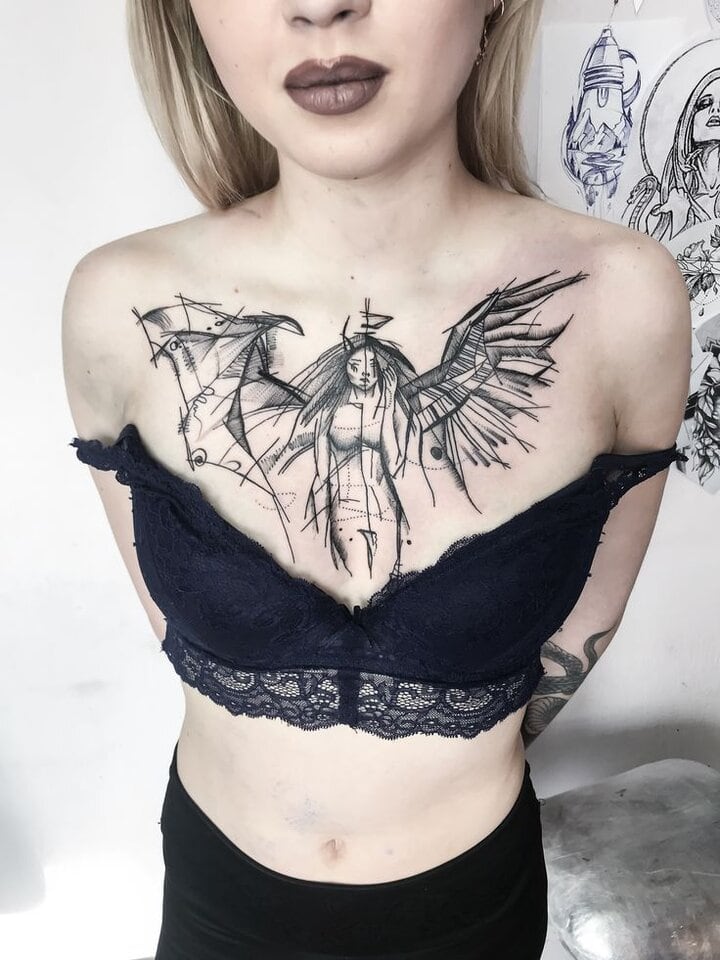 тату на грудях для жінки