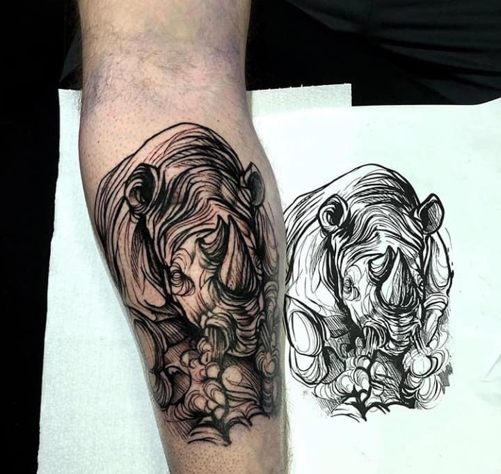 Носорог тату мужская