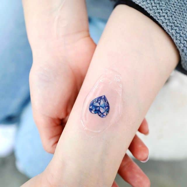 тату камень сердце