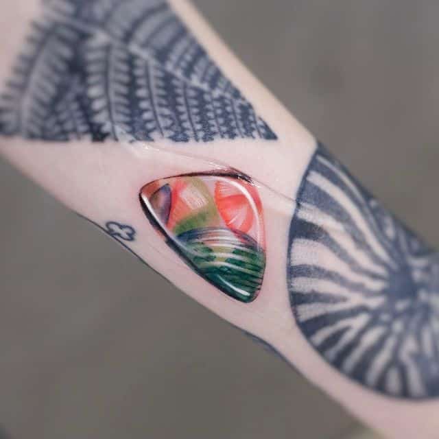 тату камень