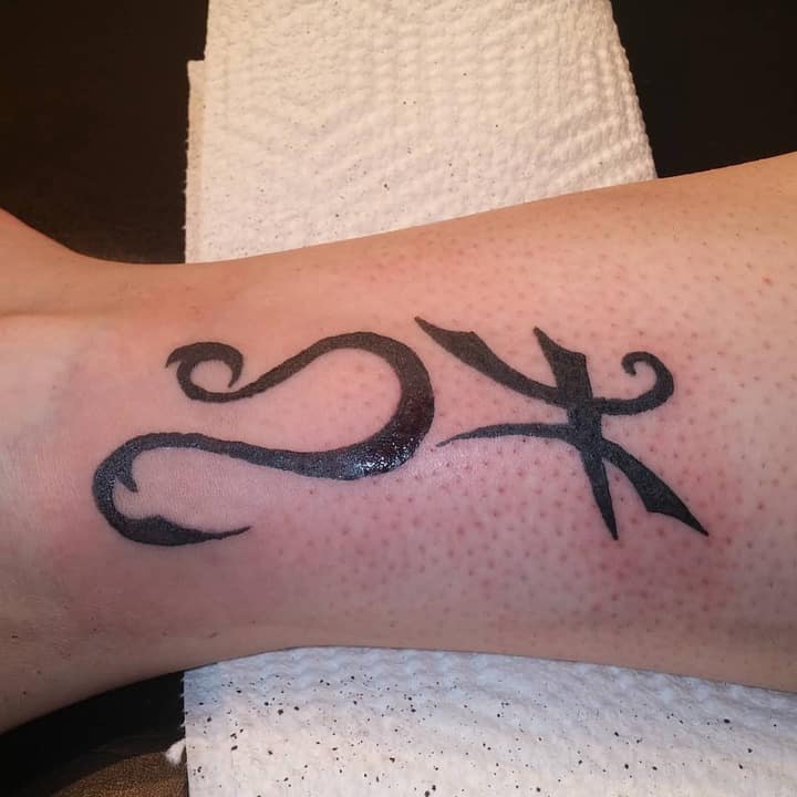 тату Лев знак