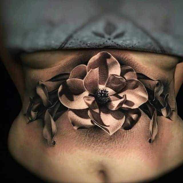 тату цветок на животе