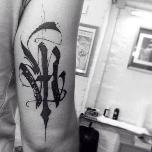 тату буква м