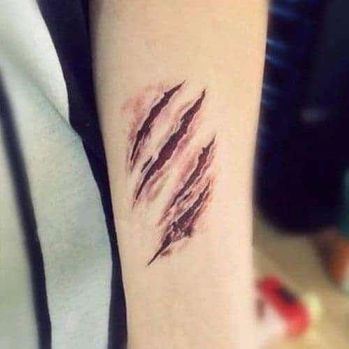 тату шрам ведмедя