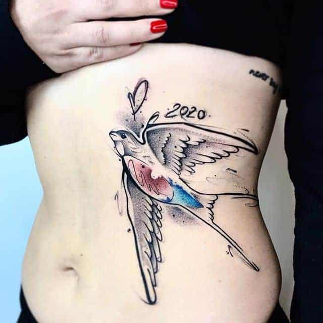 тату птичка на животе