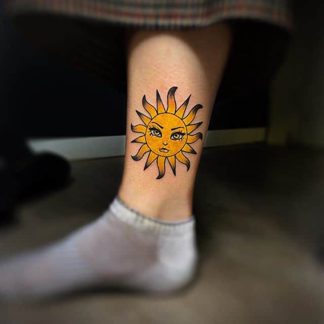 тату желтое солнце