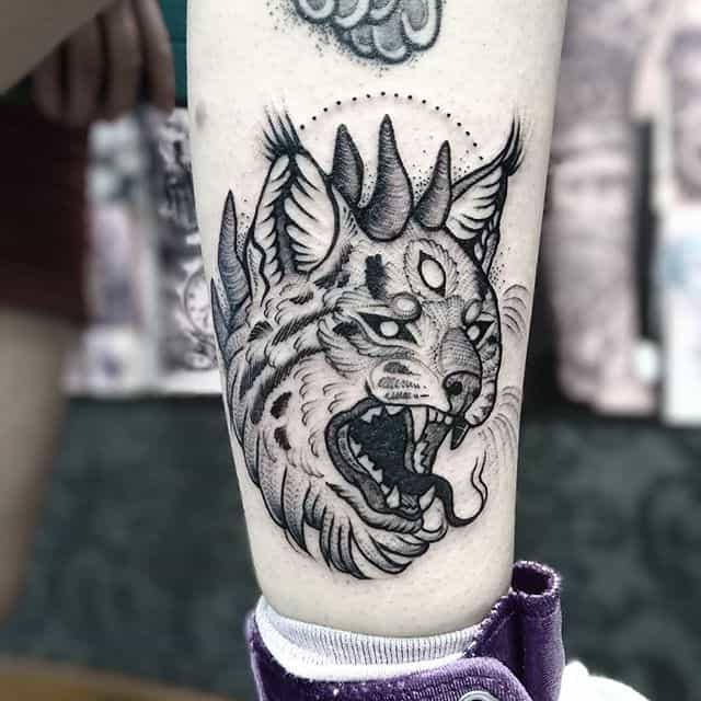 Тату рысь оскал