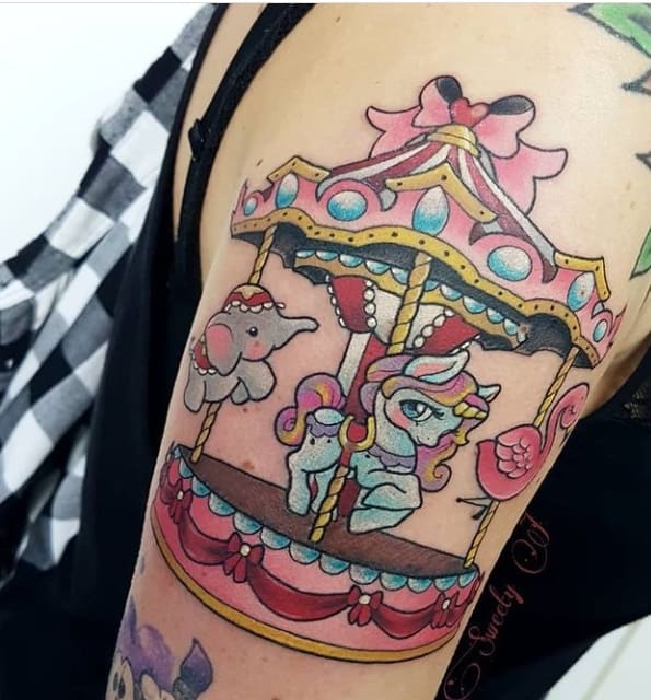 Карусель на руке тату