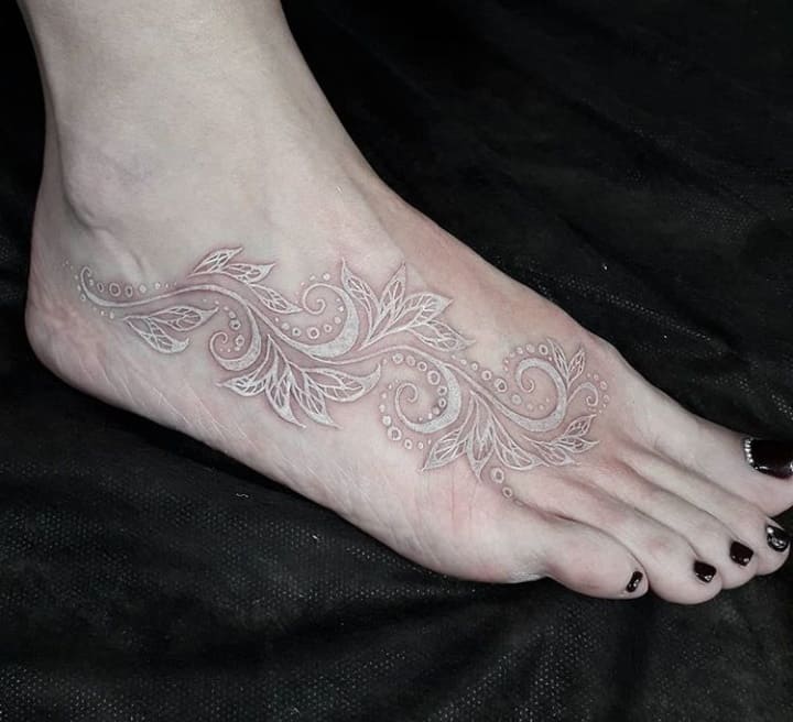 тату кружево ступня