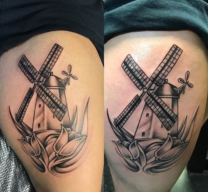 тату мельница на ноге