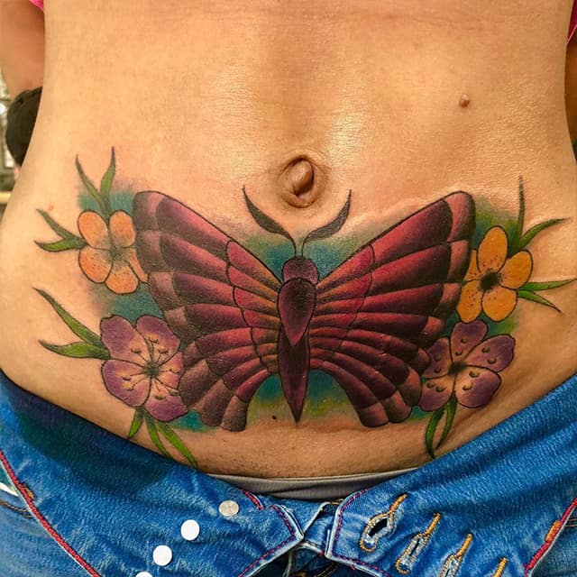 тату на животе