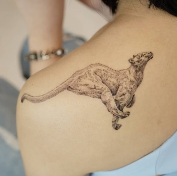 пума в прыжке тату
