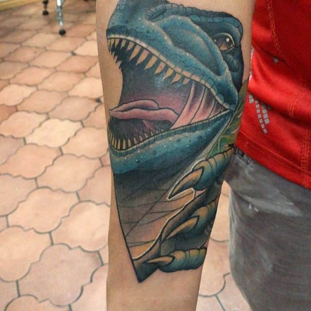 тату динозавр синий