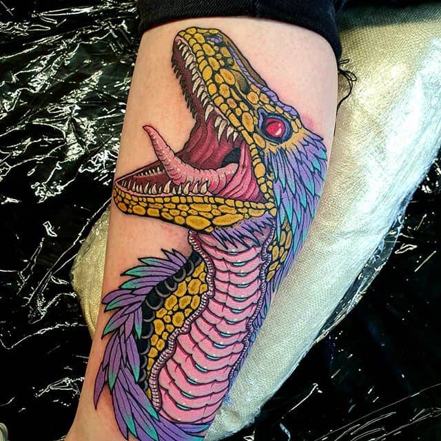 тату динозавр яркая