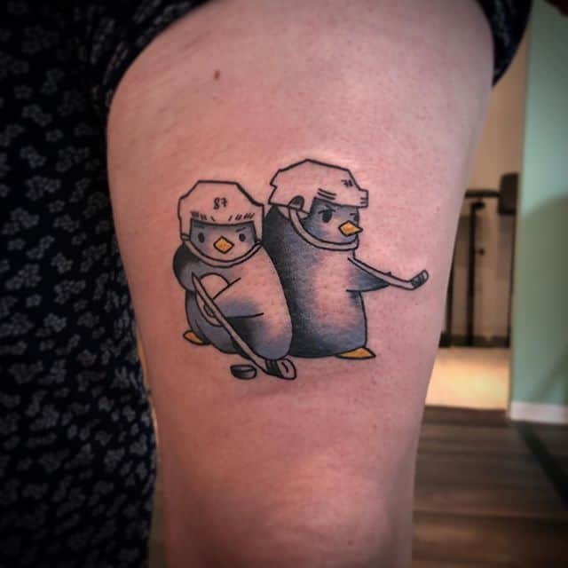тату два пингвина