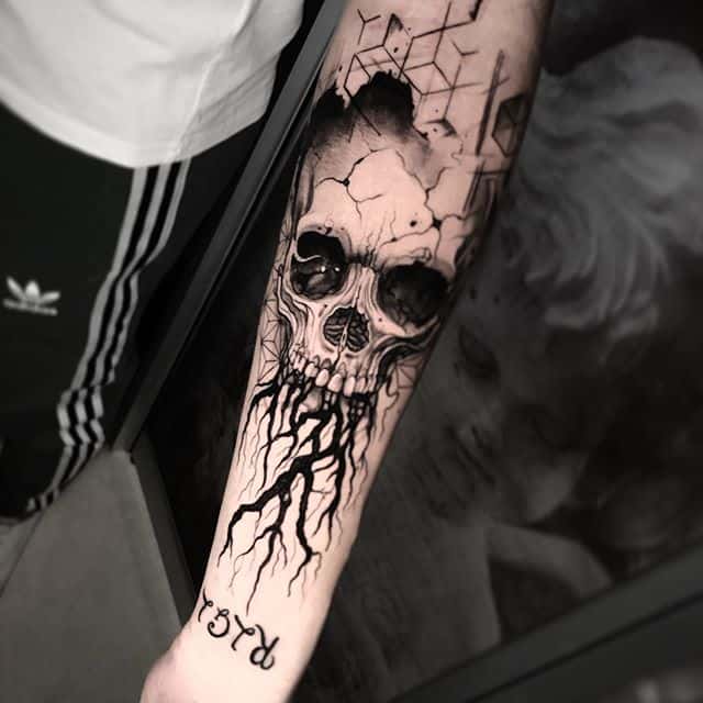 тату символ жизни череп