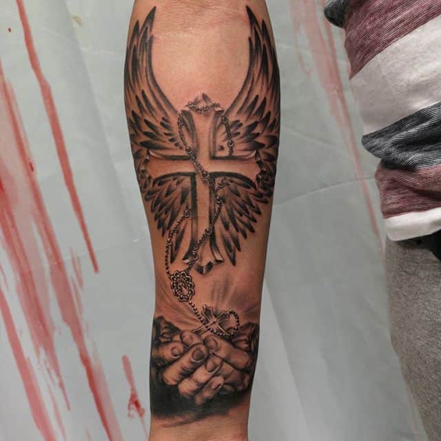 крест тату с крыльями