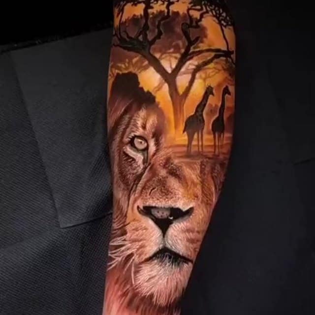 тату лев в африке