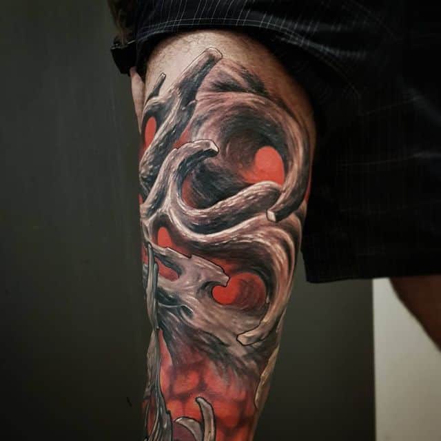 биоорганика тату на ноге