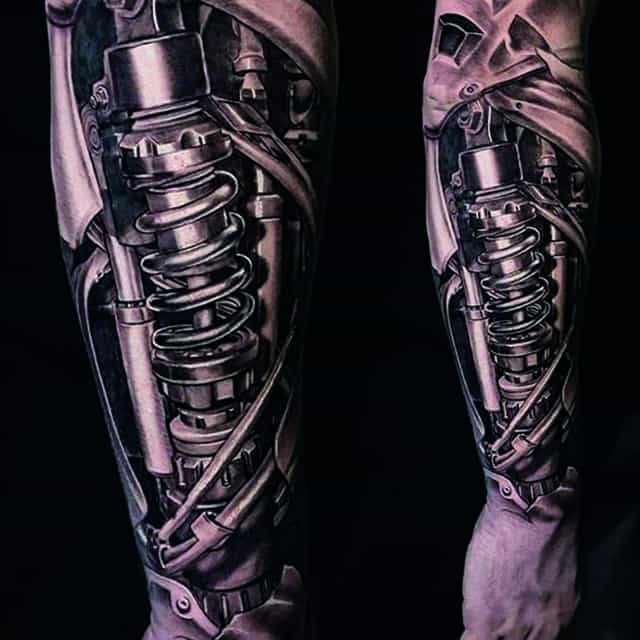 тату механика на руке