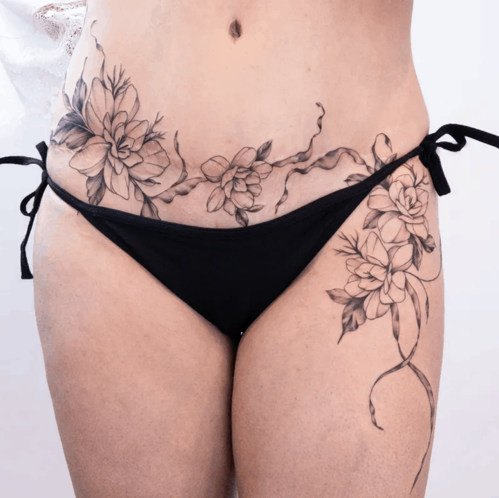 тату на шраме от кесарева сечения веточка