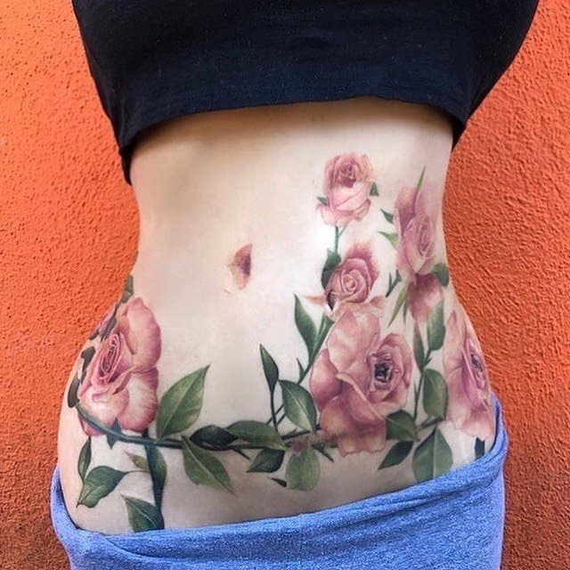 тату на шраме от кесарева сечения цветы