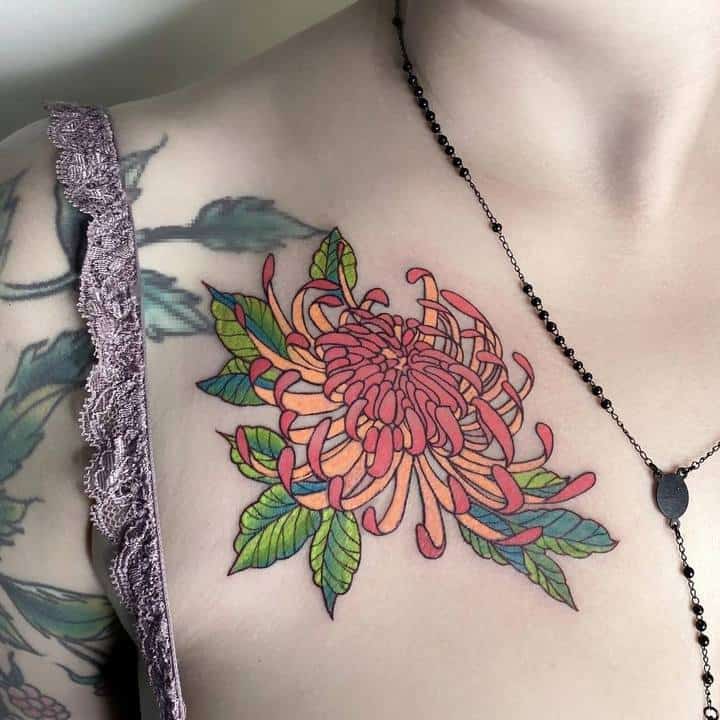 хризантема тату на ключице