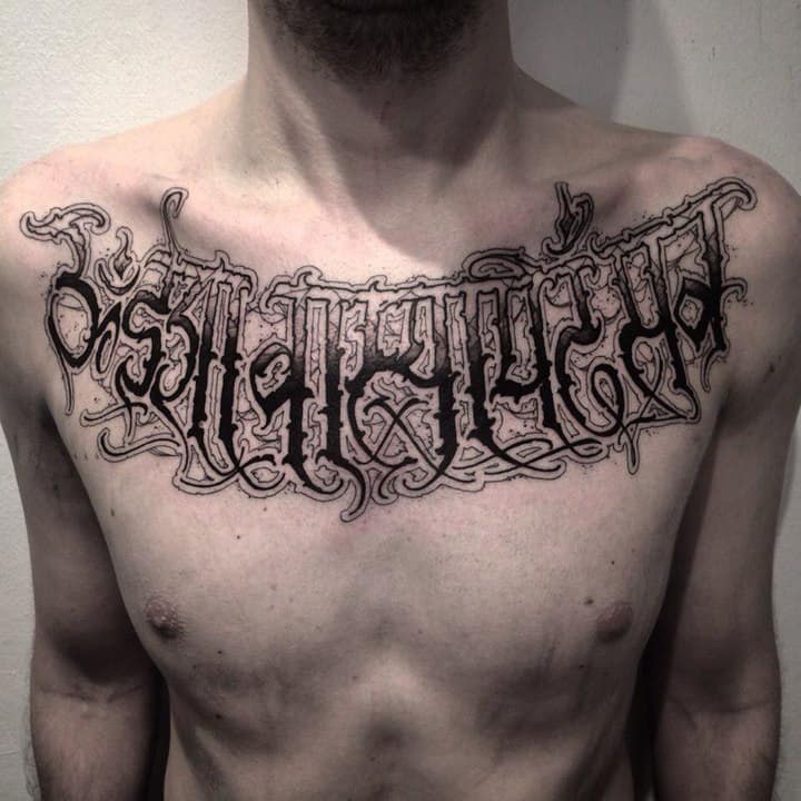 тату на груди мужское надпись
