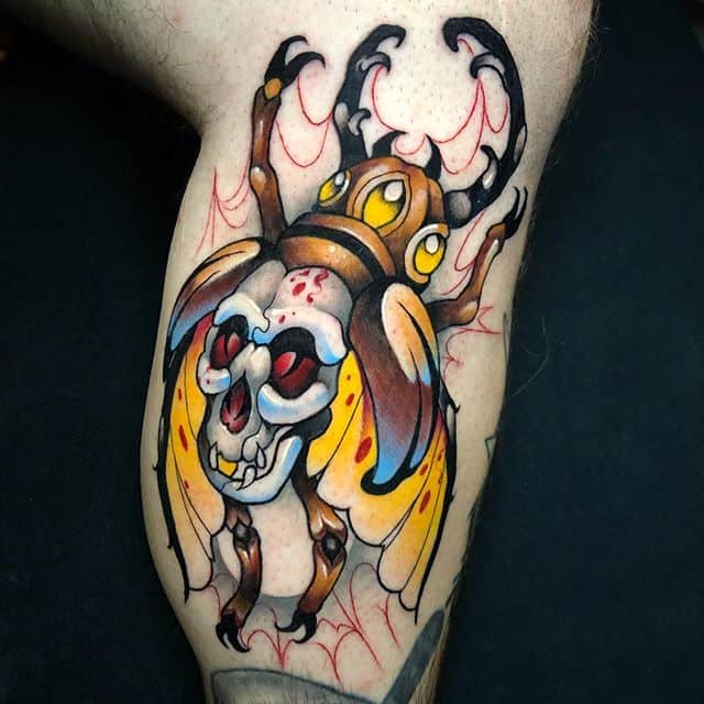 тату жук олень