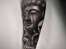 Буддийские тату на руке