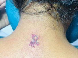 тату Лев на шее