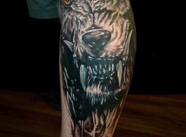 оскал жуткого волка тату