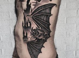 тату летучая мышь на ребрах