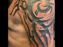 трайбл тату камень