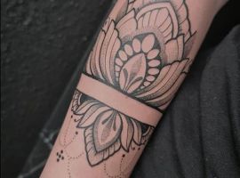 тату символ жизни лотос
