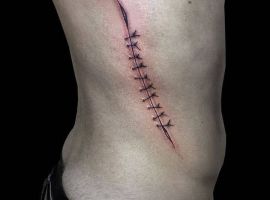 тату в виде шва