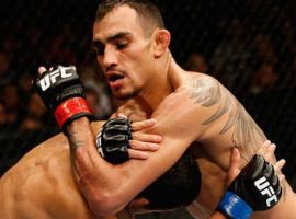 SACRAMENTO, CA – AUGUST 30: (R-L) Tony Ferguson attempts to secure a darce choke against Danny Castillo in their lightweight bout during the UFC 177 event at Sleep Train Arena on August 30, 2014 in Sacramento, California. (Photo by Josh Hedges/Zuffa LLC/Zuffa LLC via Getty Images)