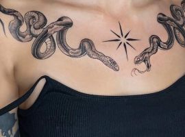 тату змії на ключицях