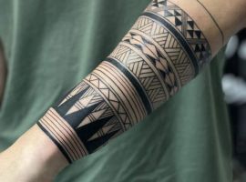 тату маорі передпліччя
