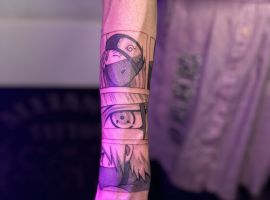 тату комікс аніме на руці