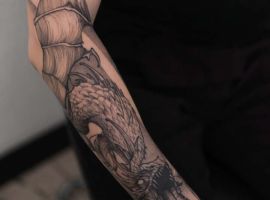 Детальний тату-рукав з драконом у стилі реалізм, створений майстром Русланом у Тату Салон Альянс. дракон рукав