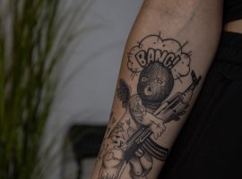 тату янгол з автоматом