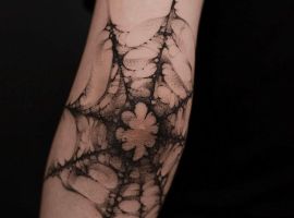 павутина на лікті тату