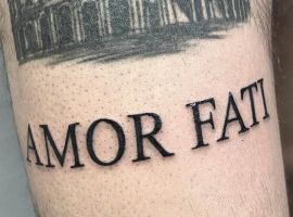 Тату "Amor Fati" на руке, символ принятия судьбы и жизненных испытаний, выполнена в стиле минимализм. Тату "Amor Fati" на руке, символ принятия судьбы и жизненных испытаний.