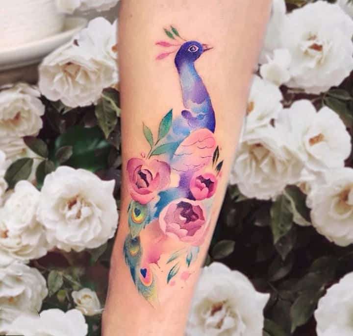Тату павлин на руке
